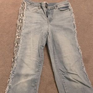 Mom jeans. light washed with snakeskin print on side.